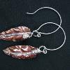 Copper and Fine Silver leaf earrings with French Hoop wire. Created using Respousse technique for forming shape in metal.   Part of a matching pin and earring set.  $195  http://www.etsy.com/listing/50834897/copper-and-fine-silver-leaf-pin-and
