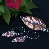 Copper and fine silver leaf pin with matching earrings.  Set is $195