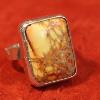 Yellow sea sediment jasper rectangle cabochon and fine silver adjustable ring.  PRICE $85.00