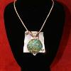 Turquoise 30mm cabochon, fine silver and NuGold Freeform pendant.  PRICE:  $150.00