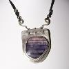 Heavy gauge fine silver and freeform rough cut amethyst cabochon.  $185