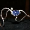 Heavy gauge fine silver hammered freeform cuff bracelet with lapis cabochon.  $135